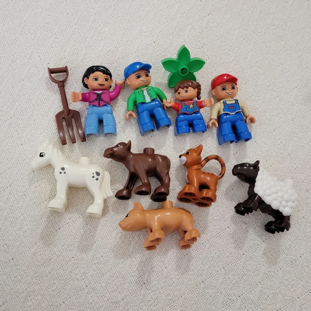 Lego Farmers set with 10 figures, including a farmer, farmer's wife, and 2 kids,